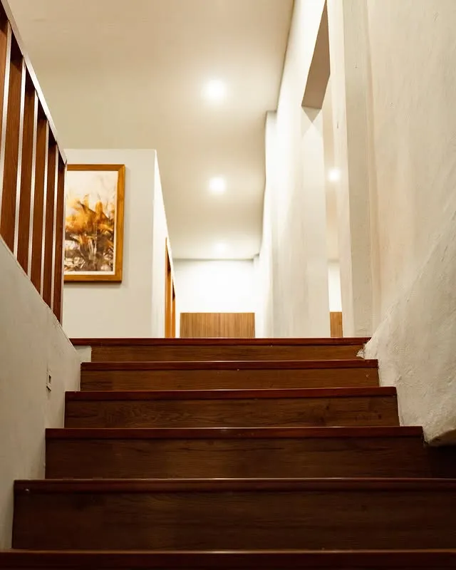 Elegant wooden stairway and Spa Interior leading to treatment rooms at MY SPA LOMBOK Kuta